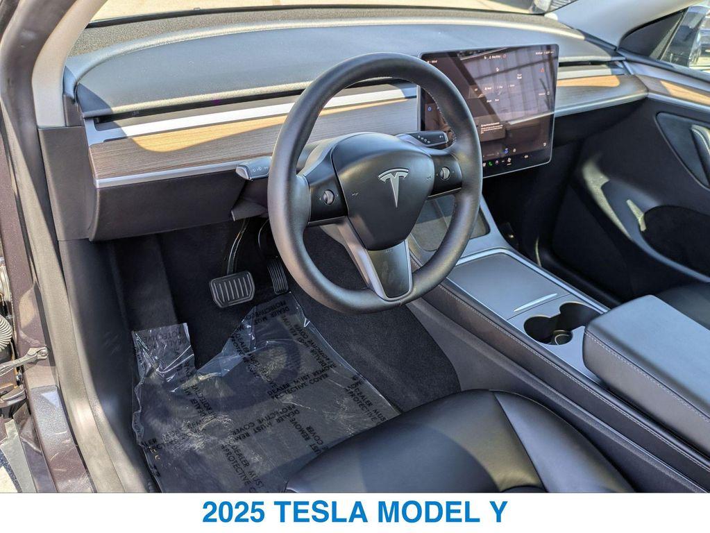 used 2025 Tesla Model Y car, priced at $37,234