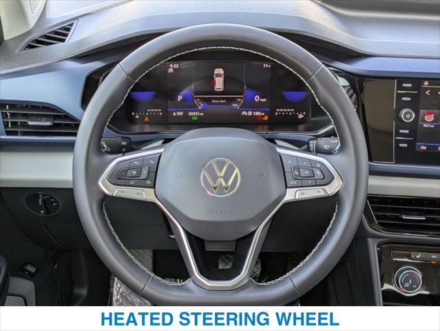 used 2023 Volkswagen Taos car, priced at $23,314