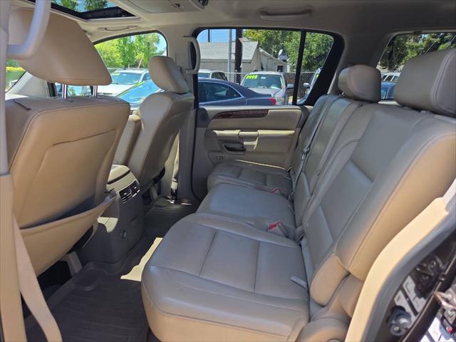 used 2011 Nissan Armada car, priced at $6,450