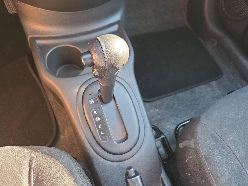 used 2015 Nissan Versa car, priced at $3,650