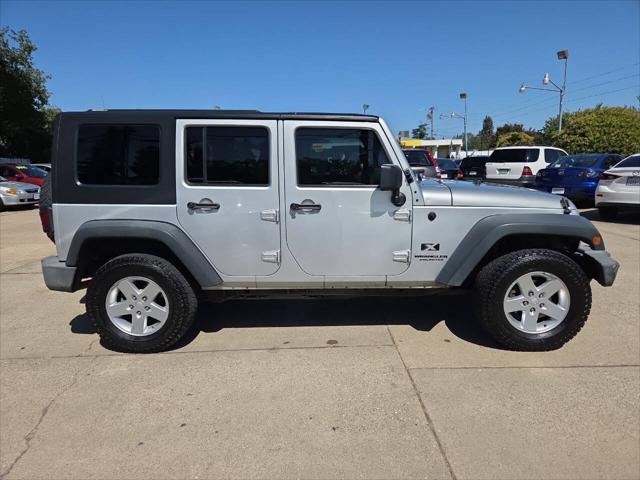 used 2009 Jeep Wrangler Unlimited car, priced at $6,995