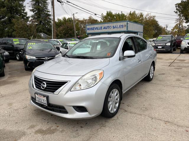 used 2014 Nissan Versa car, priced at $4,995