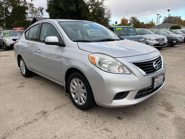 used 2014 Nissan Versa car, priced at $4,995