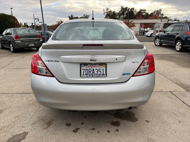 used 2014 Nissan Versa car, priced at $4,995