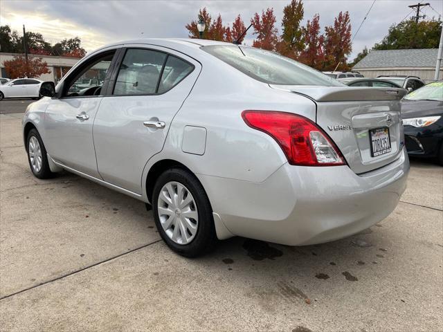 used 2014 Nissan Versa car, priced at $4,995