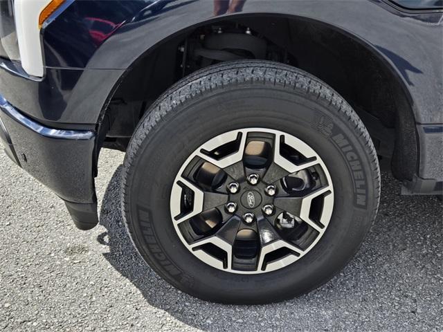 used 2022 Ford F-150 Lightning car, priced at $32,997