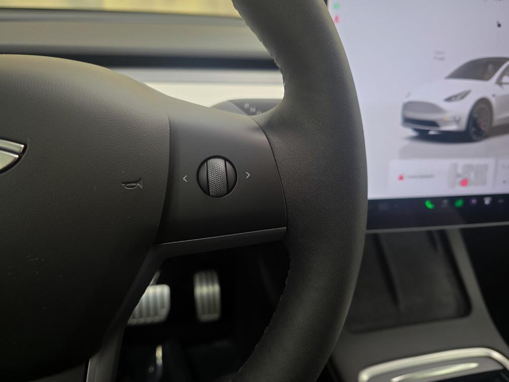 used 2025 Tesla Model Y car, priced at $41,888
