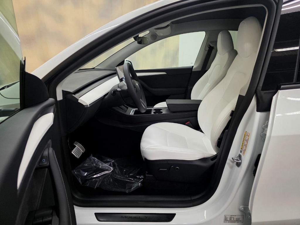 used 2025 Tesla Model Y car, priced at $41,888