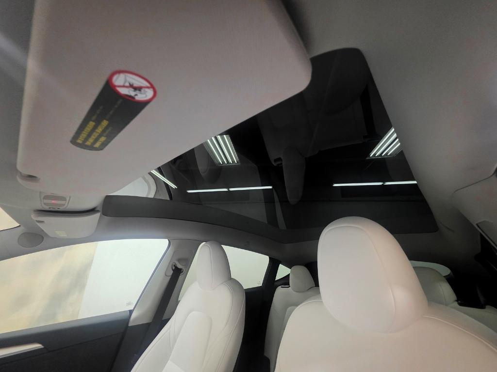 used 2025 Tesla Model Y car, priced at $41,888