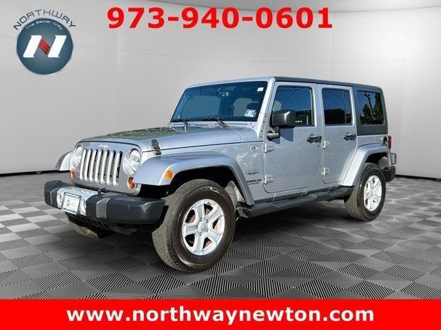 used 2013 Jeep Wrangler Unlimited car, priced at $16,797