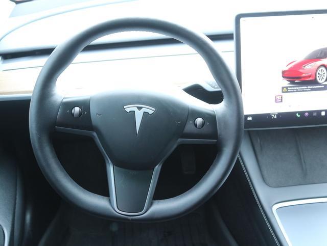 used 2023 Tesla Model 3 car, priced at $33,990