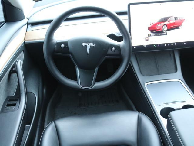 used 2023 Tesla Model 3 car, priced at $33,990