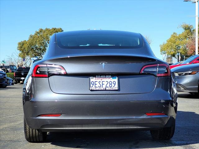 used 2023 Tesla Model 3 car, priced at $27,995