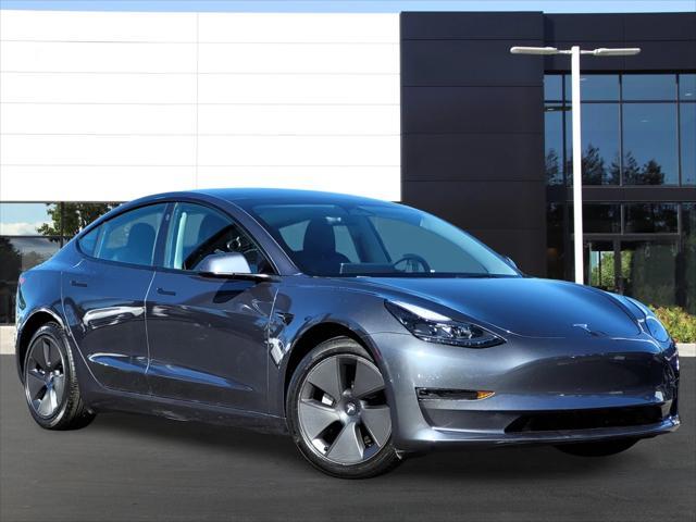 used 2023 Tesla Model 3 car, priced at $27,995