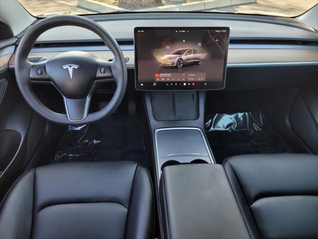 used 2023 Tesla Model 3 car, priced at $27,995