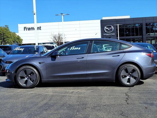 used 2023 Tesla Model 3 car, priced at $27,995