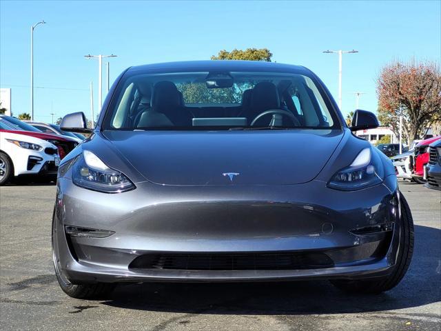 used 2023 Tesla Model 3 car, priced at $27,995