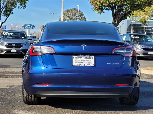 used 2022 Tesla Model 3 car, priced at $28,995