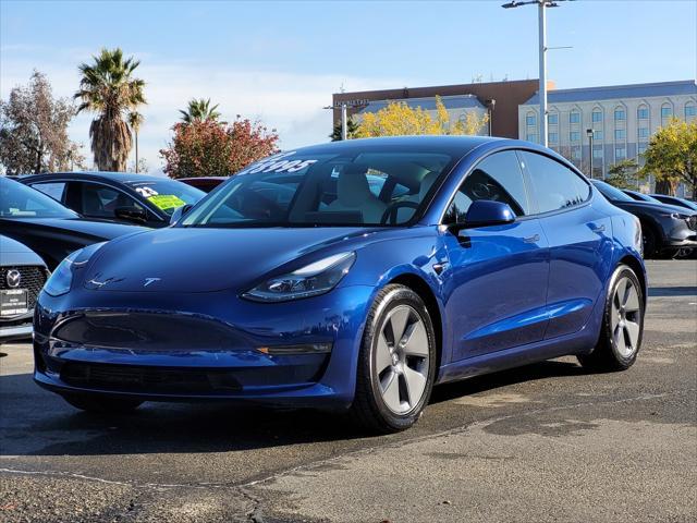 used 2022 Tesla Model 3 car, priced at $28,995