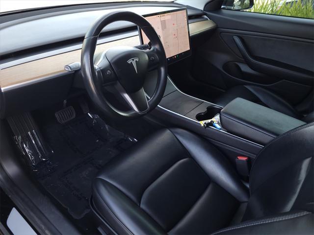 used 2019 Tesla Model 3 car, priced at $20,000