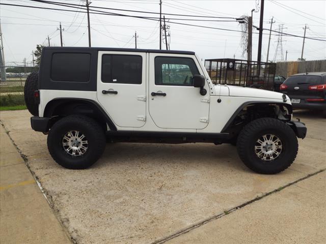 used 2010 Jeep Wrangler Unlimited car, priced at $13,995