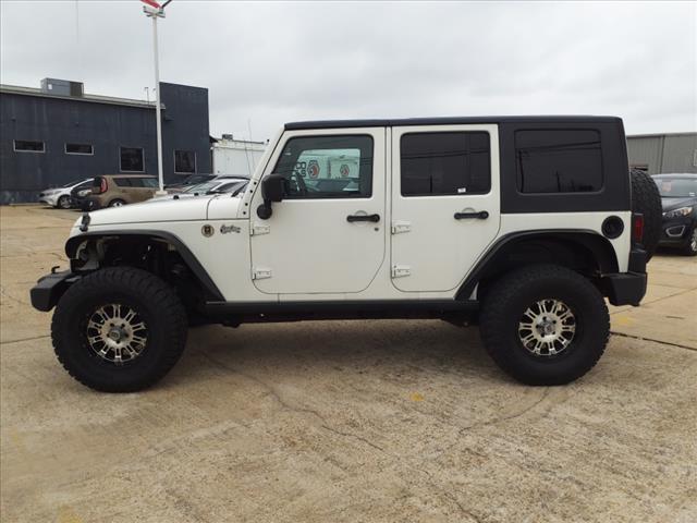 used 2010 Jeep Wrangler Unlimited car, priced at $13,995