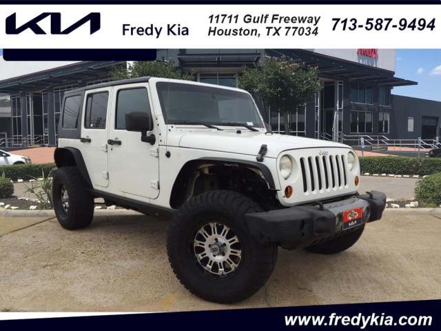 used 2010 Jeep Wrangler Unlimited car, priced at $13,995