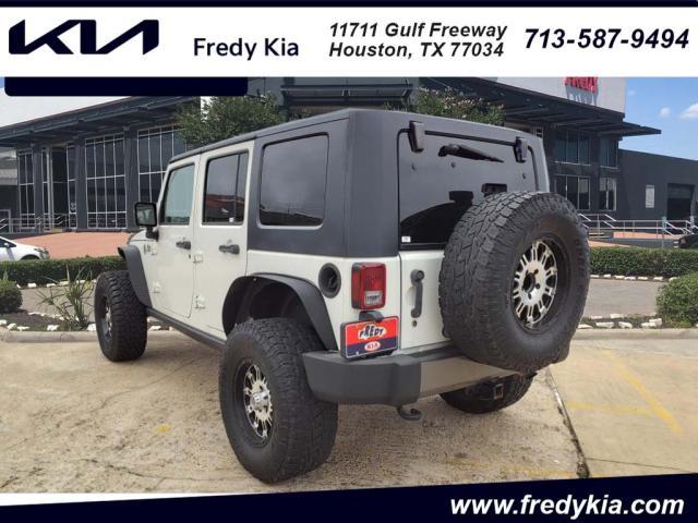 used 2010 Jeep Wrangler Unlimited car, priced at $13,995