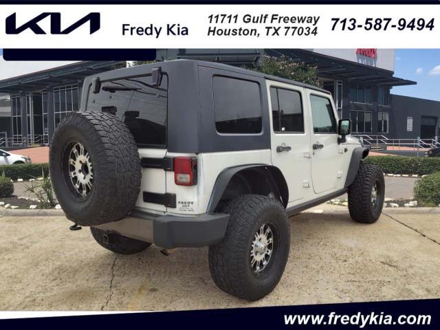 used 2010 Jeep Wrangler Unlimited car, priced at $13,995