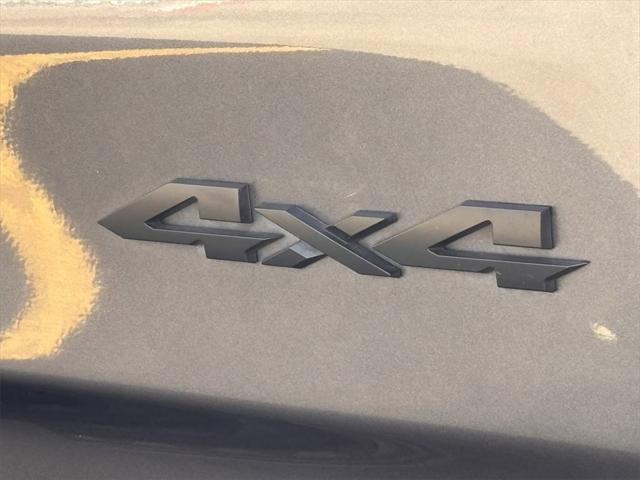 used 2019 Ram 1500 car, priced at $27,877