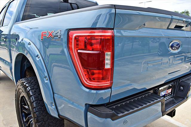 used 2023 Ford F-150 car, priced at $61,850