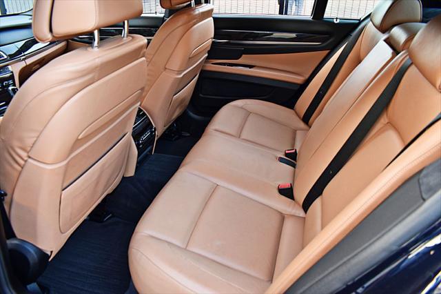 used 2015 BMW 750 car, priced at $25,850