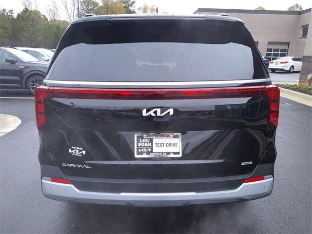 new 2025 Kia Carnival Hybrid car, priced at $45,465