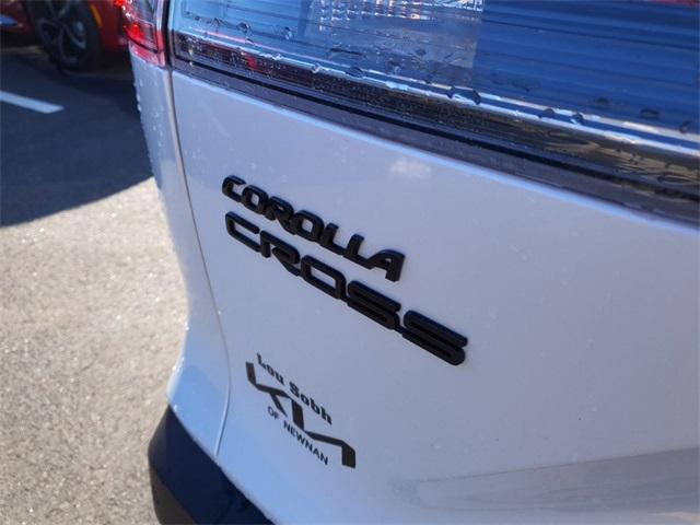 used 2024 Toyota Corolla Cross Hybrid car, priced at $29,916