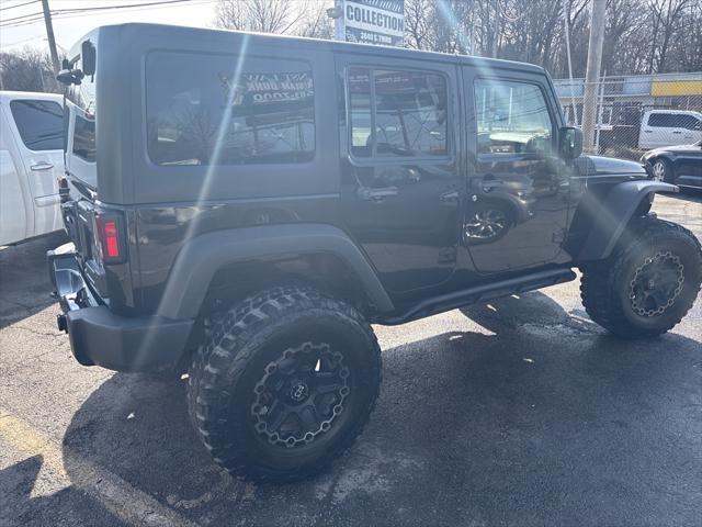 used 2015 Jeep Wrangler Unlimited car, priced at $17,995