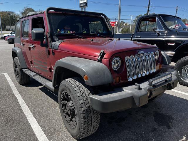 used 2012 Jeep Wrangler Unlimited car, priced at $12,388