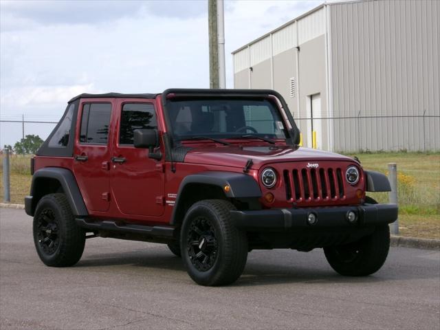used 2012 Jeep Wrangler Unlimited car, priced at $12,388