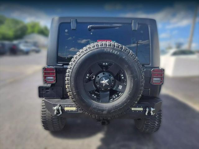 used 2018 Jeep Wrangler JK Unlimited car, priced at $18,887