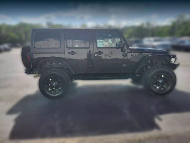 used 2018 Jeep Wrangler JK Unlimited car, priced at $18,887
