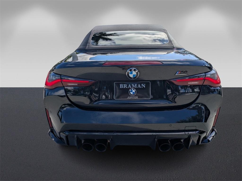 used 2022 BMW M4 car, priced at $66,595