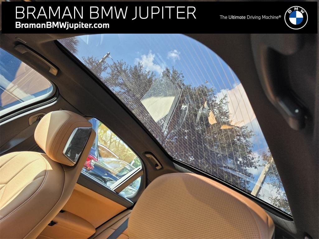 used 2023 BMW 740 car, priced at $67,200