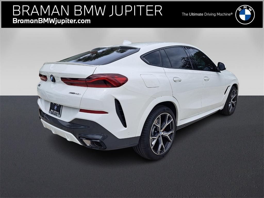 used 2023 BMW X6 car, priced at $55,965
