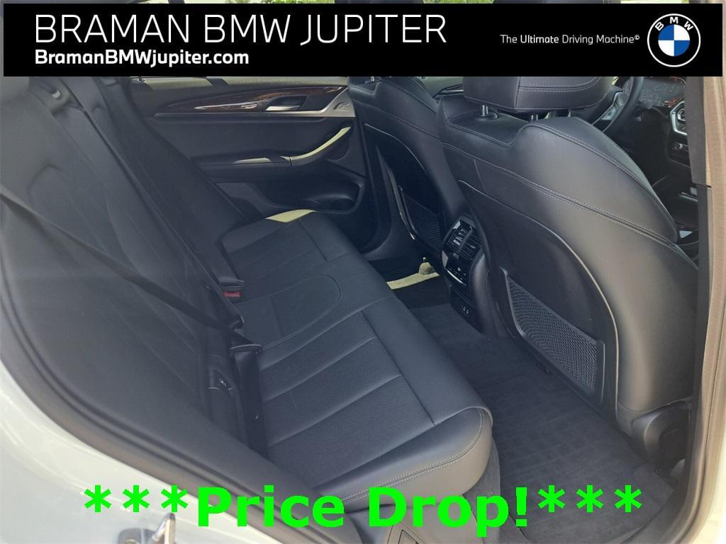 used 2023 BMW X4 car, priced at $35,163