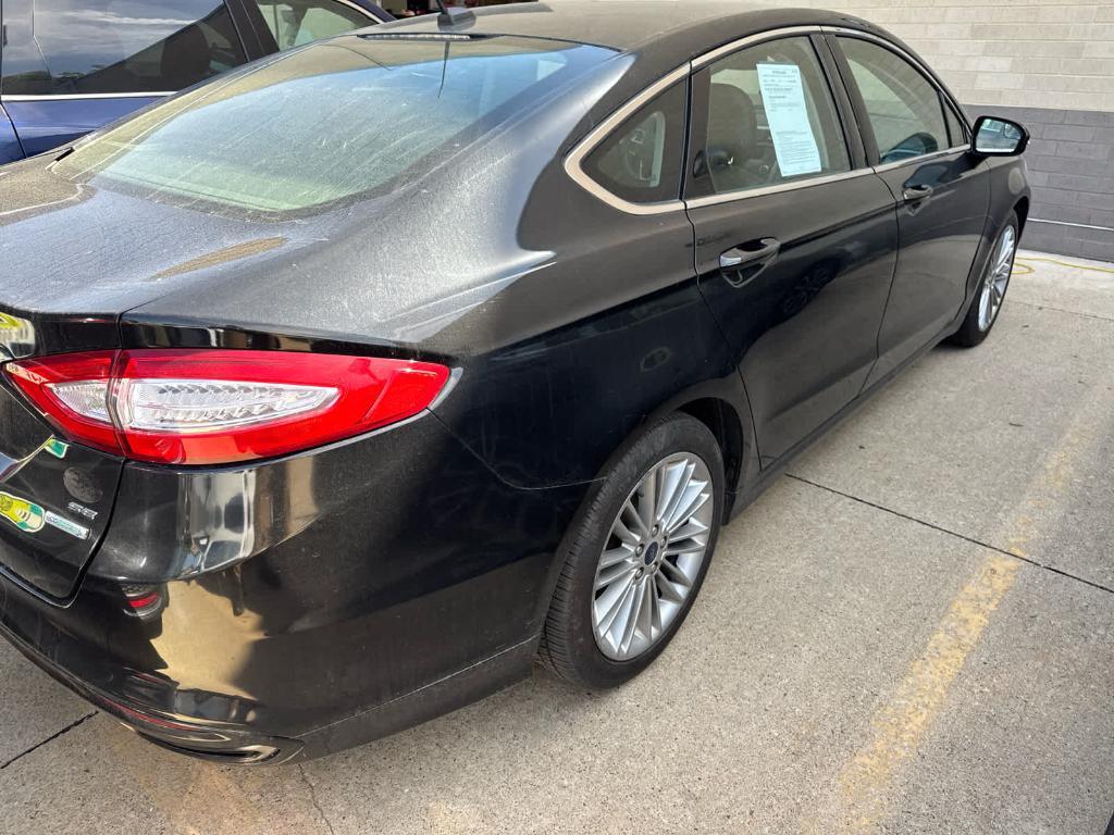 used 2014 Ford Fusion car, priced at $9,495