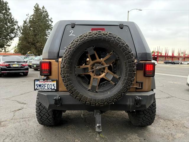 used 2015 Jeep Wrangler Unlimited car, priced at $21,499