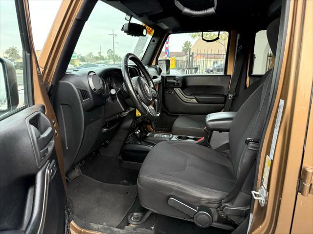 used 2015 Jeep Wrangler Unlimited car, priced at $21,499