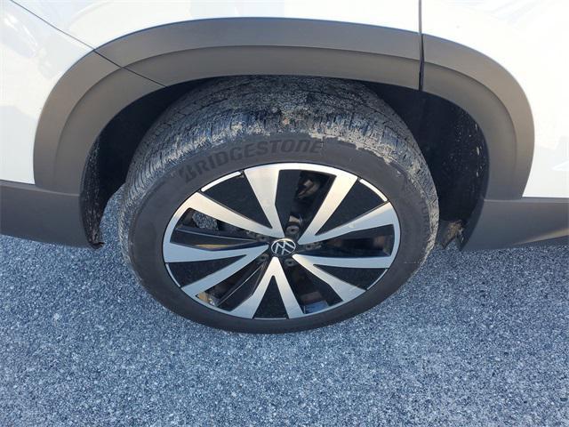 used 2024 Volkswagen Taos car, priced at $20,000