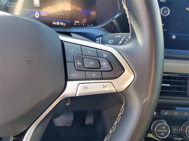 used 2024 Volkswagen Taos car, priced at $20,000