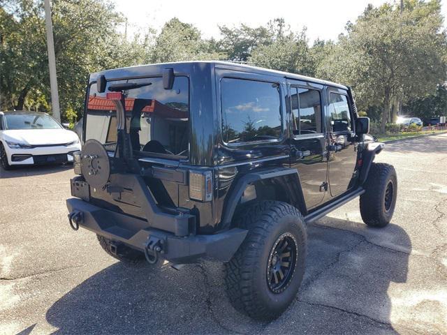 used 2015 Jeep Wrangler Unlimited car, priced at $27,480