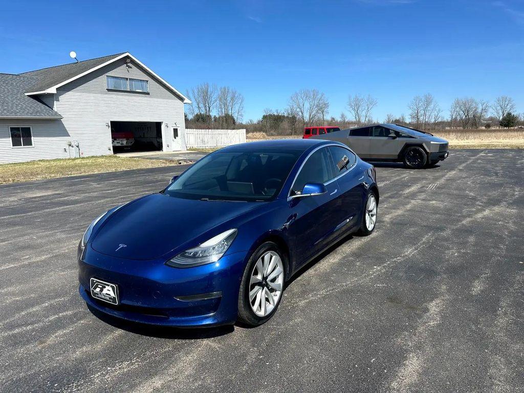 used 2018 Tesla Model 3 car, priced at $18,990
